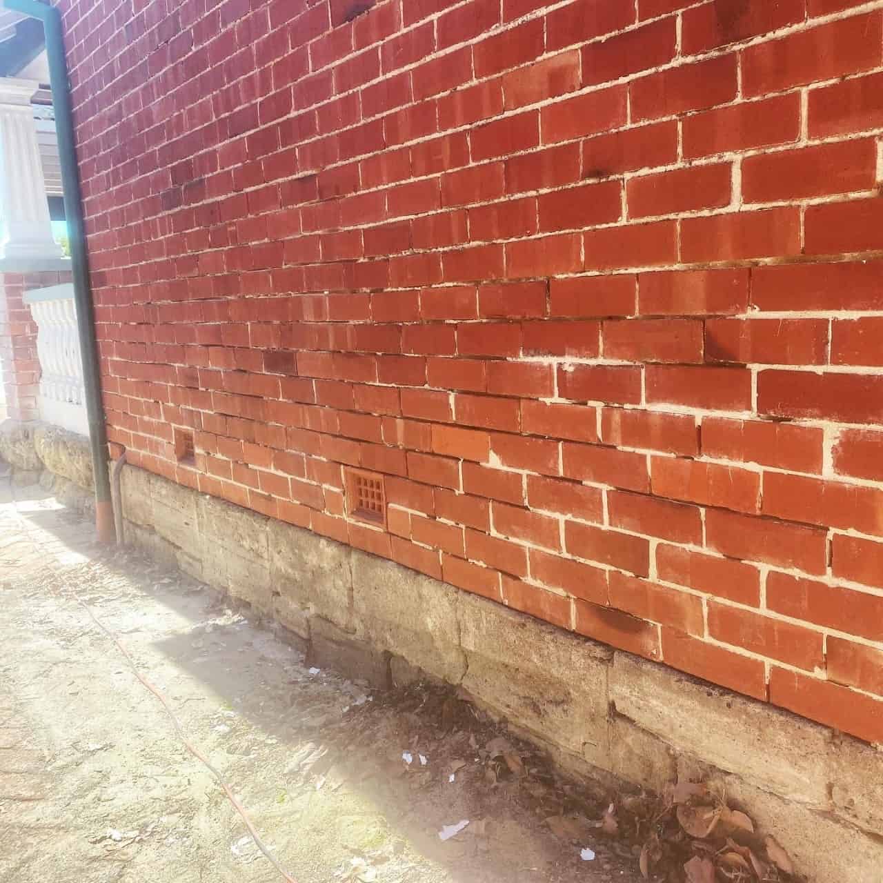 Brick Wall with crumbling mortar